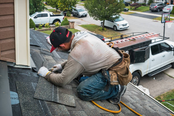 Professional Gutter Repair And Installation technician working in Oak Park, MN